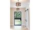 Modern entryway featuring a glass front door and sleek barn doors at 340 Colewood Way, Atlanta, GA 30328