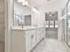 Double vanity bathroom with marble floors and a shower at 590 Plainfield St, Fayetteville, GA 30215