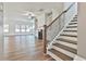 Elegant staircase with dark wood treads and black metal balusters at 590 Plainfield St, Fayetteville, GA 30215