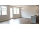 Bright dining area with large windows and new floors, adjacent to kitchen at 1074 Crest Mill Dr, Marietta, GA 30008