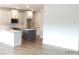 Contemporary kitchen with island and stainless appliances with new floors at 1074 Crest Mill Dr, Marietta, GA 30008