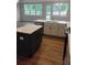 Kitchen with granite countertops, stainless steel dishwasher, and shaker cabinets at 1074 Crest Mill Dr, Marietta, GA 30008