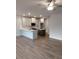 Spacious living room area with stainless steel appliances in the kitchen at 1074 Crest Mill Dr, Marietta, GA 30008