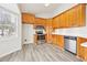 Well-lit kitchen features stainless steel appliances and light wood cabinetry at 2965 Ivy Mill Dr, Buford, GA 30519