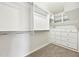 Spacious walk-in closet with built-in shelving, drawers, and ample hanging space at 2965 Ivy Mill Dr, Buford, GA 30519