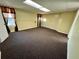 Spacious carpeted basement room with large windows at 75 Briar Patch Rd, Covington, GA 30014