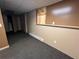 Finished basement room with carpet and neutral walls at 75 Briar Patch Rd, Covington, GA 30014