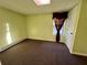 Bright basement room with carpet and window at 75 Briar Patch Rd, Covington, GA 30014