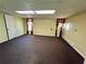 Finished basement room with neutral walls and carpet at 75 Briar Patch Rd, Covington, GA 30014