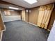 Finished basement room with neutral walls and carpet at 75 Briar Patch Rd, Covington, GA 30014