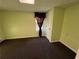 Spacious carpeted basement room with window at 75 Briar Patch Rd, Covington, GA 30014