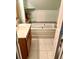 Bathroom with soaking tub, sink, and light-colored tile floor at 75 Briar Patch Rd, Covington, GA 30014