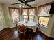 Charming breakfast nook with wood table and chairs, overlooking the backyard at 75 Briar Patch Rd, Covington, GA 30014