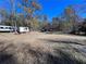 Large backyard with shed and wooded area at 75 Briar Patch Rd, Covington, GA 30014