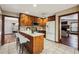 Spacious kitchen features stainless steel appliances, a kitchen island, tile floor, and custom wood cabinetry at 4211 Burnt Hickory Nw Rd, Marietta, GA 30064