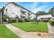 Apartment community with grassy courtyard, walkways, and seating area at 3501 Roswell Road Ne Rd # 110, Atlanta, GA 30305