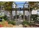 Welcoming entrance to Bradley House, featuring a gated walkway and landscaping at 3501 Roswell Road Ne Rd # 110, Atlanta, GA 30305