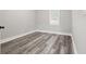 Simple bedroom with gray walls and wood-look flooring at 358 Roy Sw St, Atlanta, GA 30310