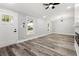 Bright living room with hardwood floors, fireplace, and high ceilings at 358 Roy Sw St, Atlanta, GA 30310