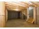 Unfinished basement with framed walls and stairs at 40 Eryn Ter, Covington, GA 30014