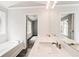 Bathroom with double vanity, garden tub, and access to bedroom at 40 Eryn Ter, Covington, GA 30014