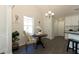 Charming breakfast nook with round table, chairs, and access to kitchen at 40 Eryn Ter, Covington, GA 30014