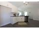 Modern kitchen with white cabinets, granite countertops, and stainless steel appliances at 40 Eryn Ter, Covington, GA 30014