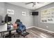 Bedroom with modern desk, chair, a ceiling fan, and a TV at 34 Clay Ct, Villa Rica, GA 30180