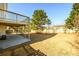 Expansive backyard featuring a deck, patio, privacy fence, and mature trees at 1188 Pine Acre Dr, Sugar Hill, GA 30518