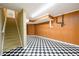 View of finished basement with stairs at 1188 Pine Acre Dr, Sugar Hill, GA 30518