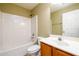Bathroom with a shower-tub combination and tile flooring at 1188 Pine Acre Dr, Sugar Hill, GA 30518