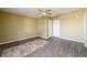 Spacious bedroom with new flooring and ceiling fan at 1188 Pine Acre Dr, Sugar Hill, GA 30518