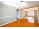 Dining room featuring tile floors, large window and base molding at 1188 Pine Acre Dr, Sugar Hill, GA 30518
