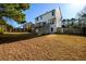 The backyard features a deck and stairs leading to a spacious, well-maintained lawn at 1188 Pine Acre Dr, Sugar Hill, GA 30518