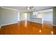 Open-concept living area featuring tile floors and a view of the kitchen with a breakfast bar at 1188 Pine Acre Dr, Sugar Hill, GA 30518