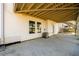 Back of house featuring concrete patio area and stairway to deck at 1188 Pine Acre Dr, Sugar Hill, GA 30518