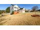 View of home, lawn, and surrounding neighborhood at 1188 Pine Acre Dr, Sugar Hill, GA 30518