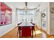 Elegant dining room with hardwood floors and modern lighting at 309 Creekbank Se Way, Smyrna, GA 30082