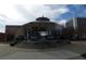 Exterior view of a classic gazebo in a town square on a cloudy day at 309 Creekbank Se Way, Smyrna, GA 30082