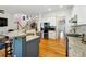 Bright kitchen featuring granite counters, stainless steel appliances and hardwood flooring at 309 Creekbank Se Way, Smyrna, GA 30082