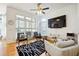 Bright living room with large windows and a modern design at 309 Creekbank Se Way, Smyrna, GA 30082