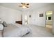 Bright, carpeted bedroom with closet and ensuite bathroom at 309 Creekbank Se Way, Smyrna, GA 30082