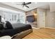 Spacious main bedroom with a ceiling fan, wood accent wall, and a large window at 309 Creekbank Se Way, Smyrna, GA 30082