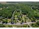 Aerial view of a home and approximate lot lines on a treed 4.3+/- acre lot at 2334 Highway 278, Social Circle, GA 30025