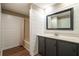Bathroom featuring a vanity with a shower/tub in the background at 2334 Highway 278, Social Circle, GA 30025