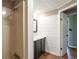 Bathroom features a sink vanity and a shower/tub with white-paneled walls at 2334 Highway 278, Social Circle, GA 30025