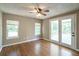 Bright bedroom with double doors leading to a deck at 2334 Highway 278, Social Circle, GA 30025