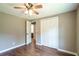 Bedroom with wood-look floors and a ceiling fan at 2334 Highway 278, Social Circle, GA 30025