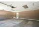 A spacious garage with painted walls and concrete flooring at 2334 Highway 278, Social Circle, GA 30025