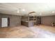 Interior of spacious garage including potential stables and a sealed white exterior door at 2334 Highway 278, Social Circle, GA 30025